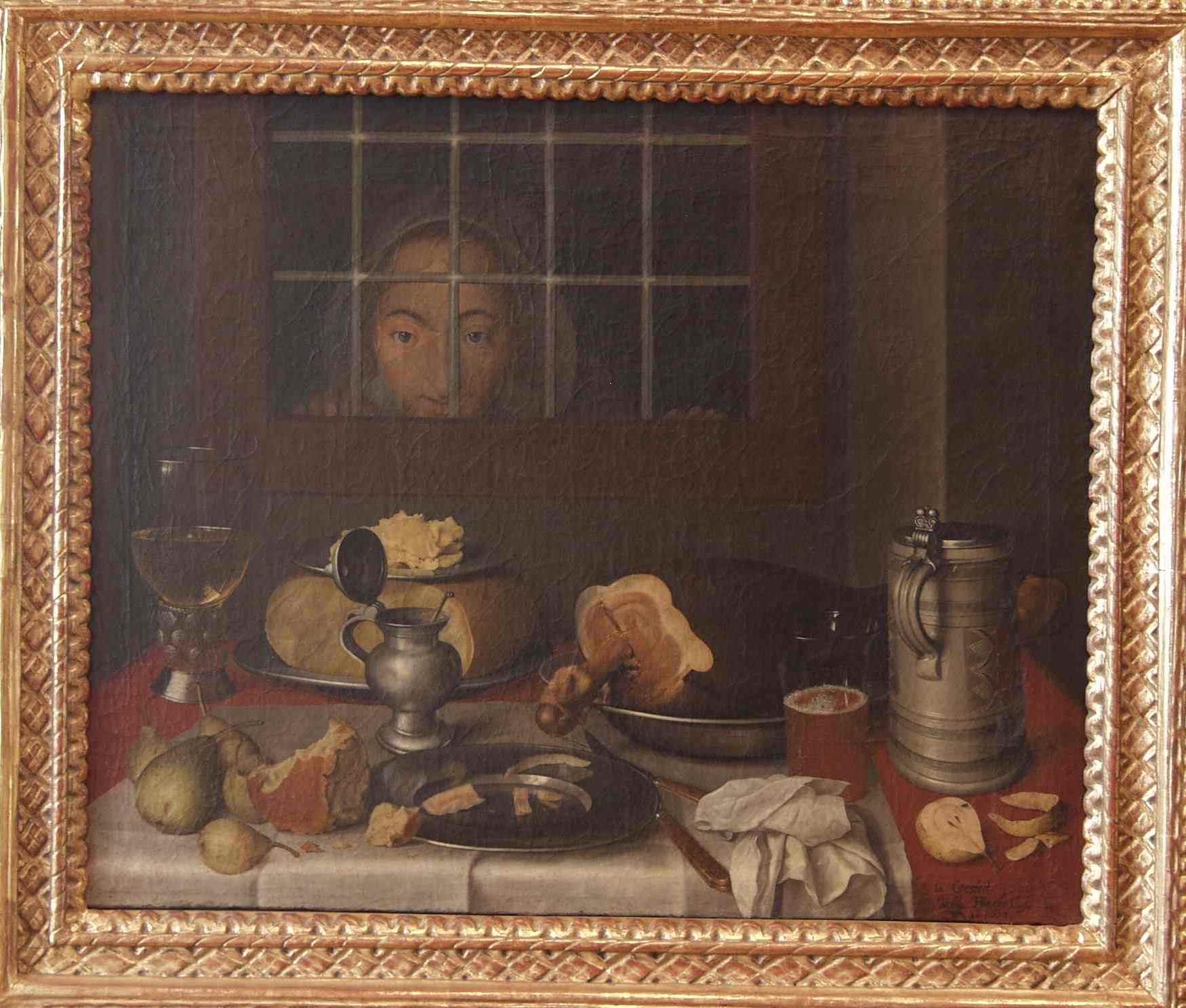 Bild zeigt ein besonderes Stillleben: Im Vordergund ein reich gedeckter Tisch und durch ein Fenster dahinter 
			schaut eine junge Frau auf das Essen.
